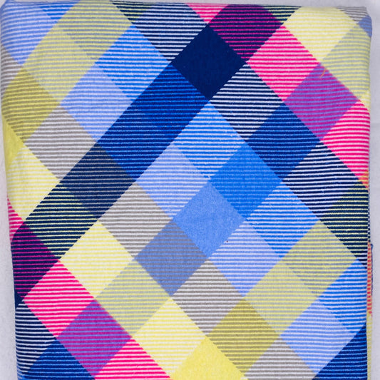 Pinks blue and yellows plaid pastel fabric 