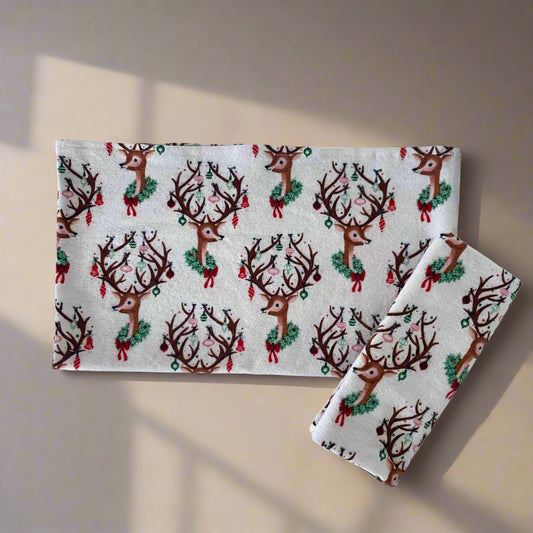 Reindeer with ornaments and wreath, vintage style 